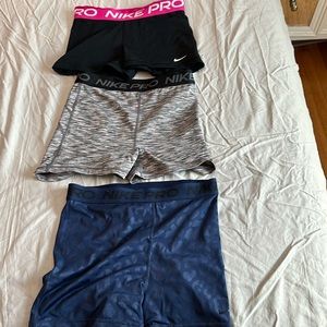 Set of three Nike pro shorts